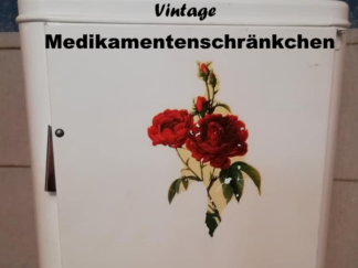 Altes Medikamentenschränkchen aus Metall