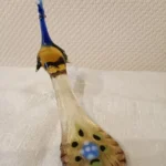 Handgefertigte glasfigur pfau
